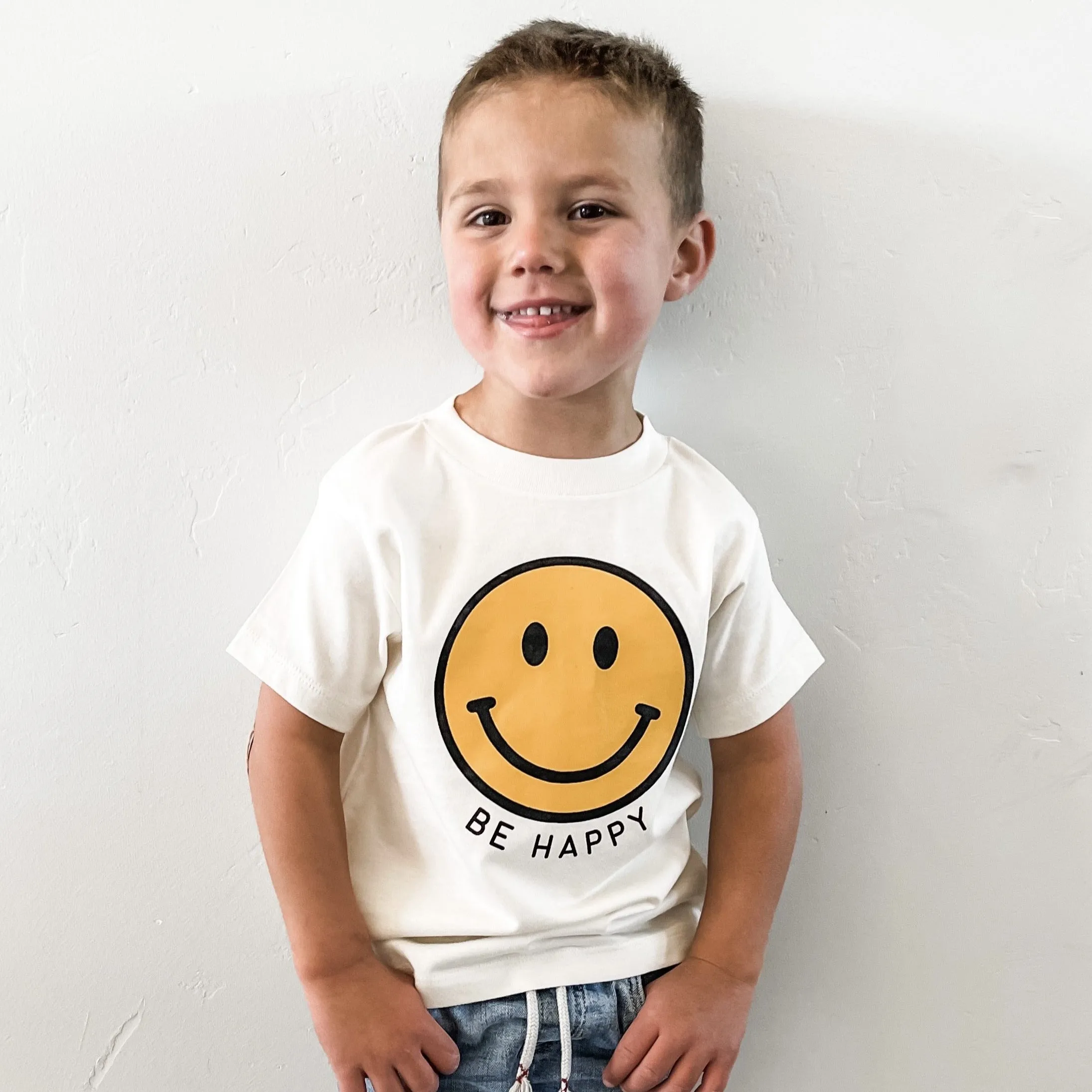 BE HAPPY - YELLOW   BLACK SMILEY FACE - Short Sleeve Child Shirt